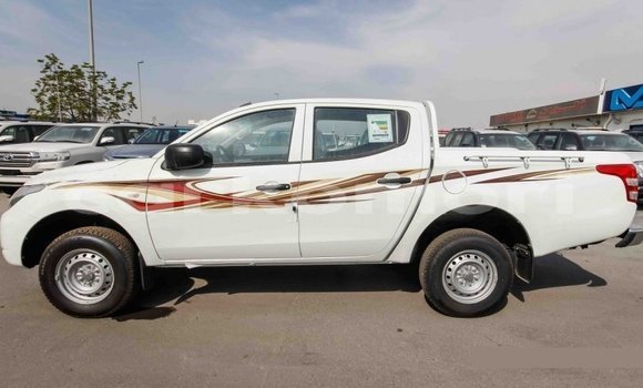 Buy Import Mitsubishi L200 White Car in Import - Dubai in Great Comore Buy Import Mitsubishi L200 White Car in Import - Dubai in Great Comore