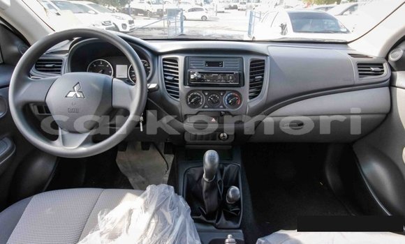 Buy Import Mitsubishi L200 White Car in Import - Dubai in Great Comore Buy Import Mitsubishi L200 White Car in Import - Dubai in Great Comore
