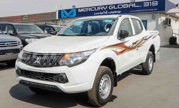Buy Import Mitsubishi L200 White Car in Import - Dubai in Great Comore Buy Import Mitsubishi L200 White Car in Import - Dubai in Great Comore
