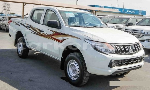 Buy Import Mitsubishi L200 White Car in Import - Dubai in Great Comore Buy Import Mitsubishi L200 White Car in Import - Dubai in Great Comore