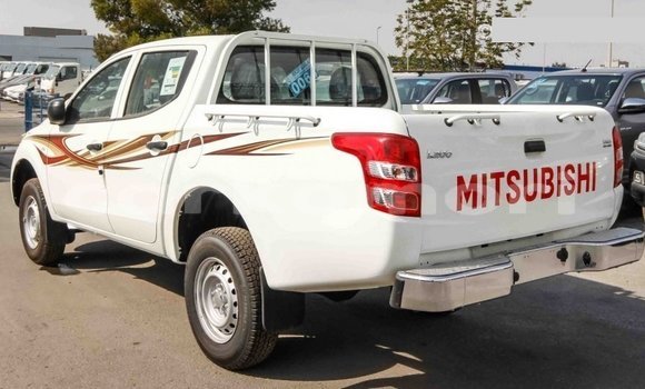Buy Import Mitsubishi L200 White Car in Import - Dubai in Great Comore Buy Import Mitsubishi L200 White Car in Import - Dubai in Great Comore