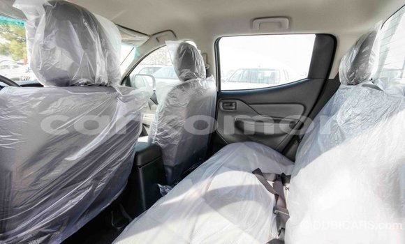 Buy Import Mitsubishi L200 White Car in Import - Dubai in Great Comore Buy Import Mitsubishi L200 White Car in Import - Dubai in Great Comore