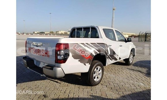 Buy Import Mitsubishi L200 White Car in Import - Dubai in Great Comore Buy Import Mitsubishi L200 White Car in Import - Dubai in Great Comore