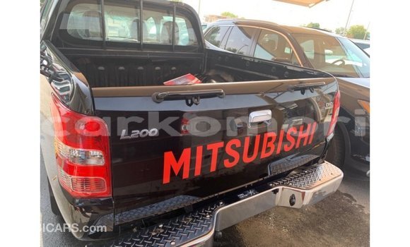 Buy Import Mitsubishi L200 Black Car in Import - Dubai in Great Comore Buy Import Mitsubishi L200 Black Car in Import - Dubai in Great Comore