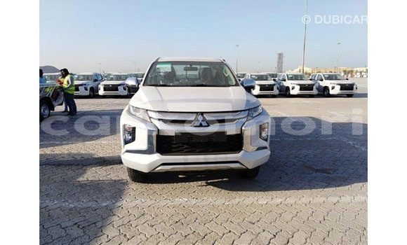 Buy Import Mitsubishi L200 White Car in Import - Dubai in Great Comore Buy Import Mitsubishi L200 White Car in Import - Dubai in Great Comore