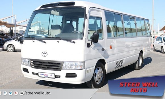 Buy Import Toyota Coaster White Car in Import - Dubai in Great Comore Buy Import Toyota Coaster White Car in Import - Dubai in Great Comore