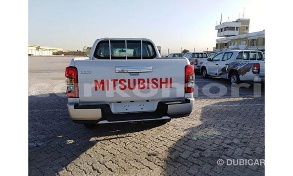 Buy Import Mitsubishi L200 White Car in Import - Dubai in Great Comore Buy Import Mitsubishi L200 White Car in Import - Dubai in Great Comore