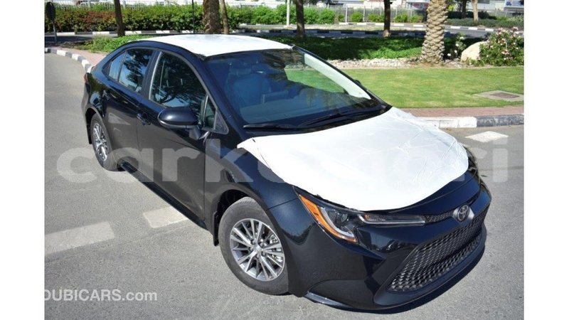 Big with watermark toyota corolla grande comore import dubai 1708