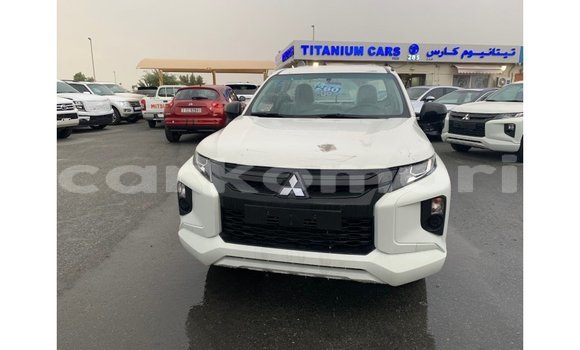 Buy Import Mitsubishi L200 White Car in Import - Dubai in Great Comore Buy Import Mitsubishi L200 White Car in Import - Dubai in Great Comore