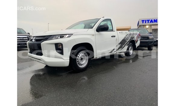 Buy Import Mitsubishi L200 White Car in Import - Dubai in Great Comore Buy Import Mitsubishi L200 White Car in Import - Dubai in Great Comore