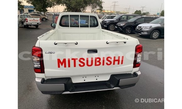 Buy Import Mitsubishi L200 White Car in Import - Dubai in Great Comore Buy Import Mitsubishi L200 White Car in Import - Dubai in Great Comore