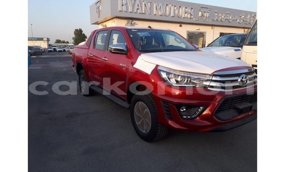 Buy Import Toyota Hilux Red Car in Import - Dubai in Great Comore Buy Import Toyota Hilux Red Car in Import - Dubai in Great Comore