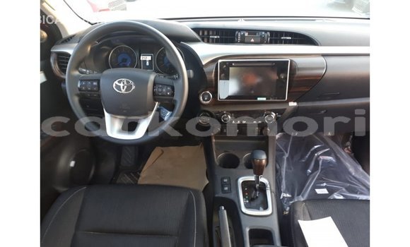 Buy Import Toyota Hilux Red Car in Import - Dubai in Great Comore Buy Import Toyota Hilux Red Car in Import - Dubai in Great Comore