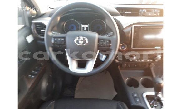 Buy Import Toyota Hilux Red Car in Import - Dubai in Great Comore Buy Import Toyota Hilux Red Car in Import - Dubai in Great Comore