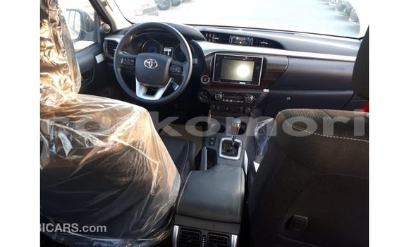 Buy Import Toyota Hilux Red Car in Import - Dubai in Great Comore Buy Import Toyota Hilux Red Car in Import - Dubai in Great Comore