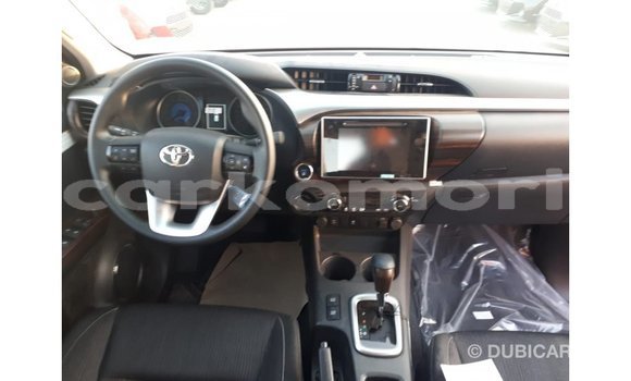 Buy Import Toyota Hilux Red Car in Import - Dubai in Great Comore Buy Import Toyota Hilux Red Car in Import - Dubai in Great Comore