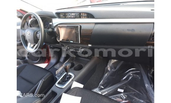 Buy Import Toyota Hilux Red Car in Import - Dubai in Great Comore Buy Import Toyota Hilux Red Car in Import - Dubai in Great Comore