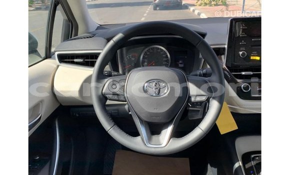 Buy Import Toyota Corolla White Car in Import - Dubai in Great Comore Buy Import Toyota Corolla White Car in Import - Dubai in Great Comore