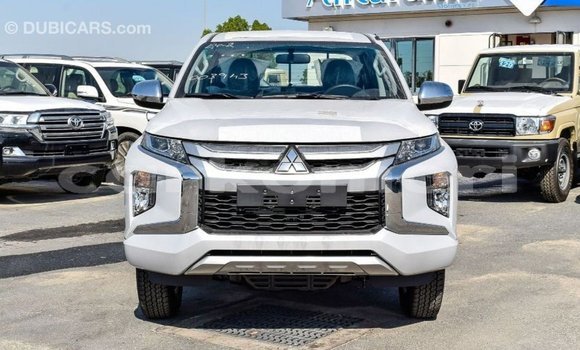Buy Import Mitsubishi L200 White Car in Import - Dubai in Great Comore Buy Import Mitsubishi L200 White Car in Import - Dubai in Great Comore