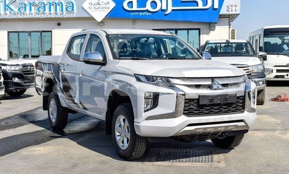 Buy Import Mitsubishi L200 White Car in Import - Dubai in Great Comore Buy Import Mitsubishi L200 White Car in Import - Dubai in Great Comore