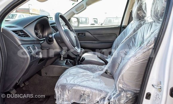 Buy Import Mitsubishi L200 White Car in Import - Dubai in Great Comore Buy Import Mitsubishi L200 White Car in Import - Dubai in Great Comore