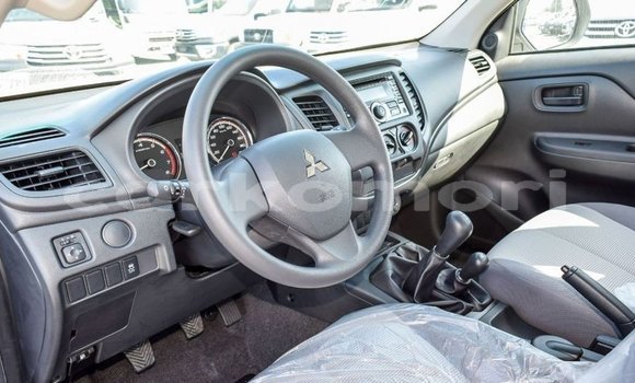 Buy Import Mitsubishi L200 White Car in Import - Dubai in Great Comore Buy Import Mitsubishi L200 White Car in Import - Dubai in Great Comore