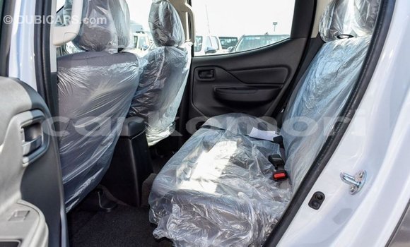 Buy Import Mitsubishi L200 White Car in Import - Dubai in Great Comore Buy Import Mitsubishi L200 White Car in Import - Dubai in Great Comore
