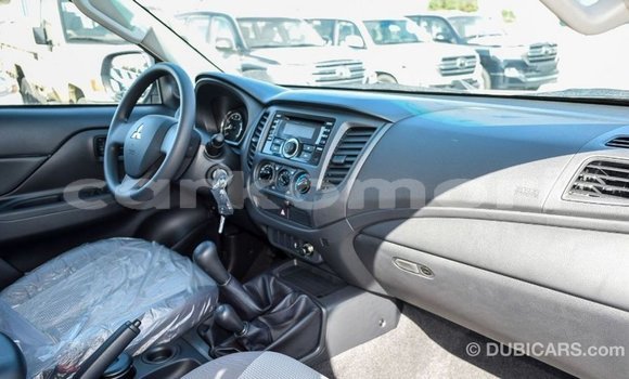 Buy Import Mitsubishi L200 White Car in Import - Dubai in Great Comore Buy Import Mitsubishi L200 White Car in Import - Dubai in Great Comore