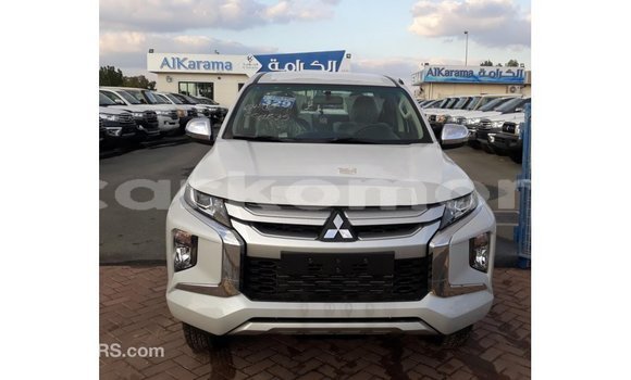 Buy Import Mitsubishi L200 White Car in Import - Dubai in Great Comore Buy Import Mitsubishi L200 White Car in Import - Dubai in Great Comore