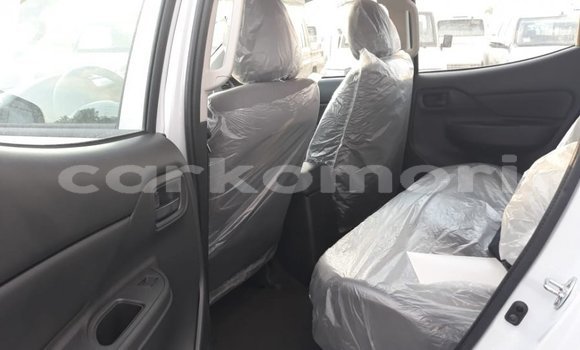 Buy Import Mitsubishi L200 White Car in Import - Dubai in Great Comore Buy Import Mitsubishi L200 White Car in Import - Dubai in Great Comore