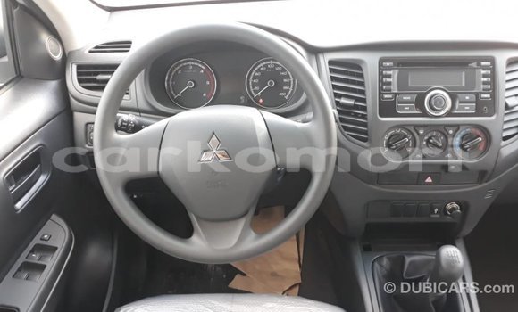 Buy Import Mitsubishi L200 White Car in Import - Dubai in Great Comore Buy Import Mitsubishi L200 White Car in Import - Dubai in Great Comore