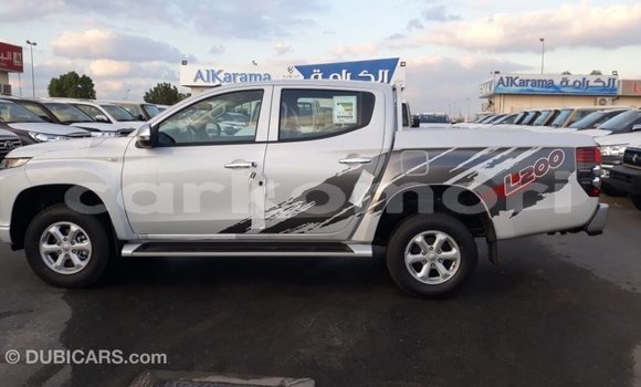 Buy Import Mitsubishi L200 White Car in Import - Dubai in Great Comore Buy Import Mitsubishi L200 White Car in Import - Dubai in Great Comore