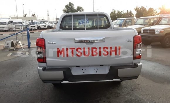 Buy Import Mitsubishi L200 White Car in Import - Dubai in Great Comore Buy Import Mitsubishi L200 White Car in Import - Dubai in Great Comore