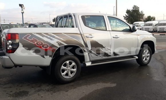 Buy Import Mitsubishi L200 White Car in Import - Dubai in Great Comore Buy Import Mitsubishi L200 White Car in Import - Dubai in Great Comore