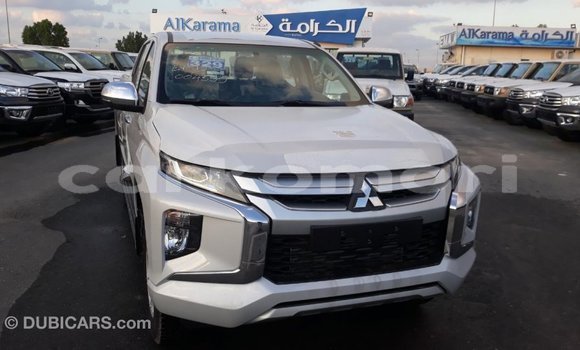 Buy Import Mitsubishi L200 White Car in Import - Dubai in Great Comore Buy Import Mitsubishi L200 White Car in Import - Dubai in Great Comore