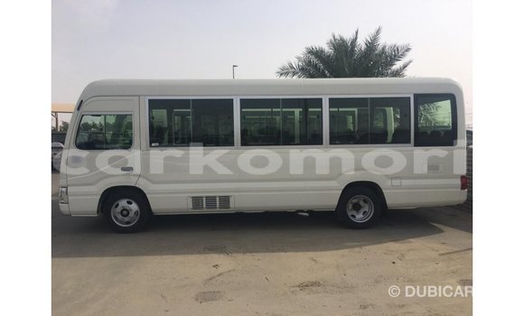 Acheter Import Voiture Toyota Coaster Blanc à Import - Dubai, Grande Comore Acheter Import Voiture Toyota Coaster Blanc à Import - Dubai, Grande Comore
