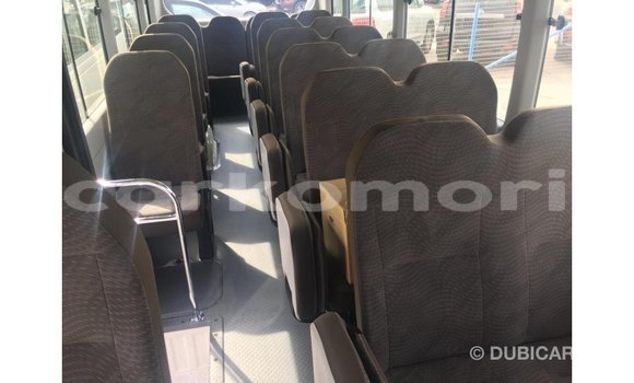 Acheter Import Voiture Toyota Coaster Blanc à Import - Dubai, Grande Comore Acheter Import Voiture Toyota Coaster Blanc à Import - Dubai, Grande Comore