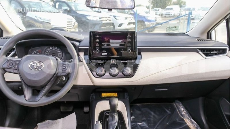 Big with watermark toyota corolla grande comore import dubai 2210
