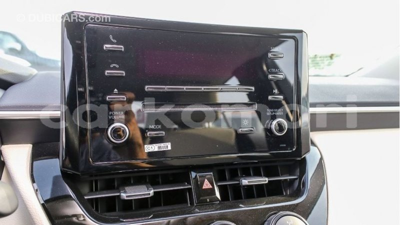 Big with watermark toyota corolla grande comore import dubai 2210