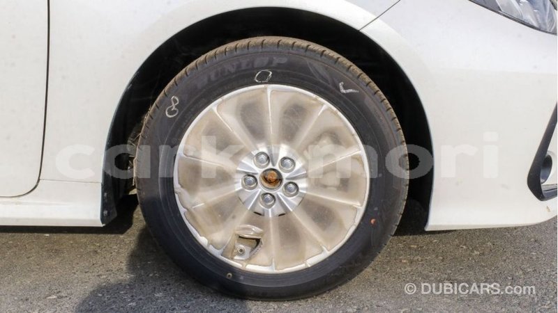 Big with watermark toyota corolla grande comore import dubai 2210