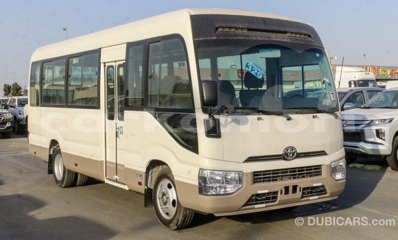 Acheter Import Voiture Toyota Coaster Blanc à Import - Dubai, Grande Comore Acheter Import Voiture Toyota Coaster Blanc à Import - Dubai, Grande Comore