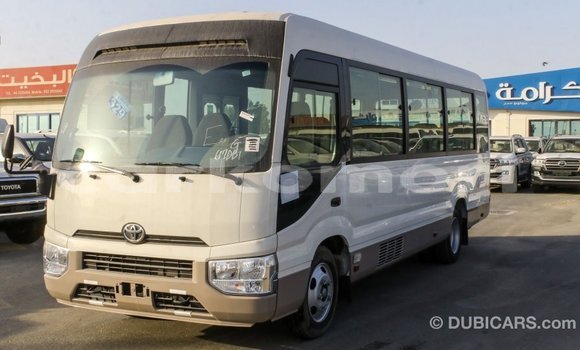 Acheter Import Voiture Toyota Coaster Blanc à Import - Dubai, Grande Comore Acheter Import Voiture Toyota Coaster Blanc à Import - Dubai, Grande Comore