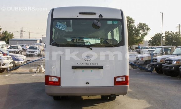 Acheter Import Voiture Toyota Coaster Blanc à Import - Dubai, Grande Comore Acheter Import Voiture Toyota Coaster Blanc à Import - Dubai, Grande Comore