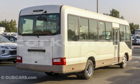 Acheter Import Voiture Toyota Coaster Blanc à Import - Dubai, Grande Comore Acheter Import Voiture Toyota Coaster Blanc à Import - Dubai, Grande Comore