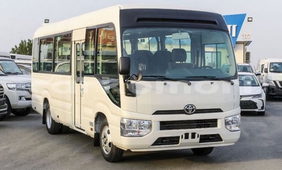 Acheter Import Voiture Toyota Coaster Blanc à Import - Dubai, Grande Comore Acheter Import Voiture Toyota Coaster Blanc à Import - Dubai, Grande Comore
