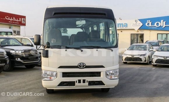 Acheter Import Voiture Toyota Coaster Blanc à Import - Dubai, Grande Comore Acheter Import Voiture Toyota Coaster Blanc à Import - Dubai, Grande Comore
