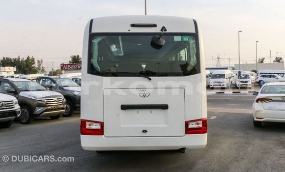 Acheter Import Voiture Toyota Coaster Blanc à Import - Dubai, Grande Comore Acheter Import Voiture Toyota Coaster Blanc à Import - Dubai, Grande Comore