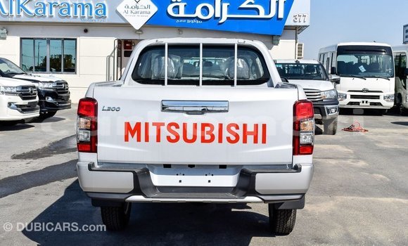 Acheter Import Voiture Mitsubishi L200 Blanc à Import - Dubai, Grande Comore Acheter Import Voiture Mitsubishi L200 Blanc à Import - Dubai, Grande Comore