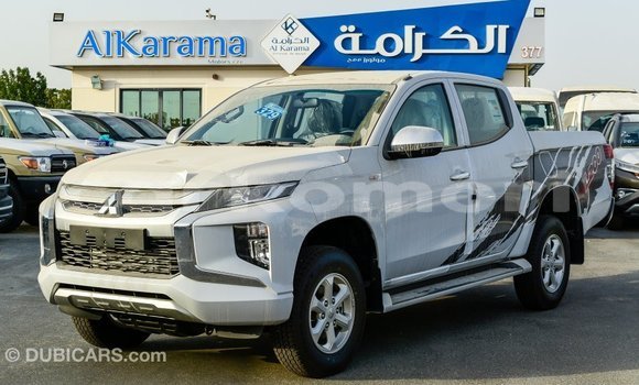 Acheter Import Voiture Mitsubishi L200 Blanc à Import - Dubai, Grande Comore Acheter Import Voiture Mitsubishi L200 Blanc à Import - Dubai, Grande Comore