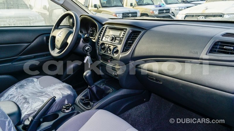 Big with watermark mitsubishi l200 grande comore import dubai 2609